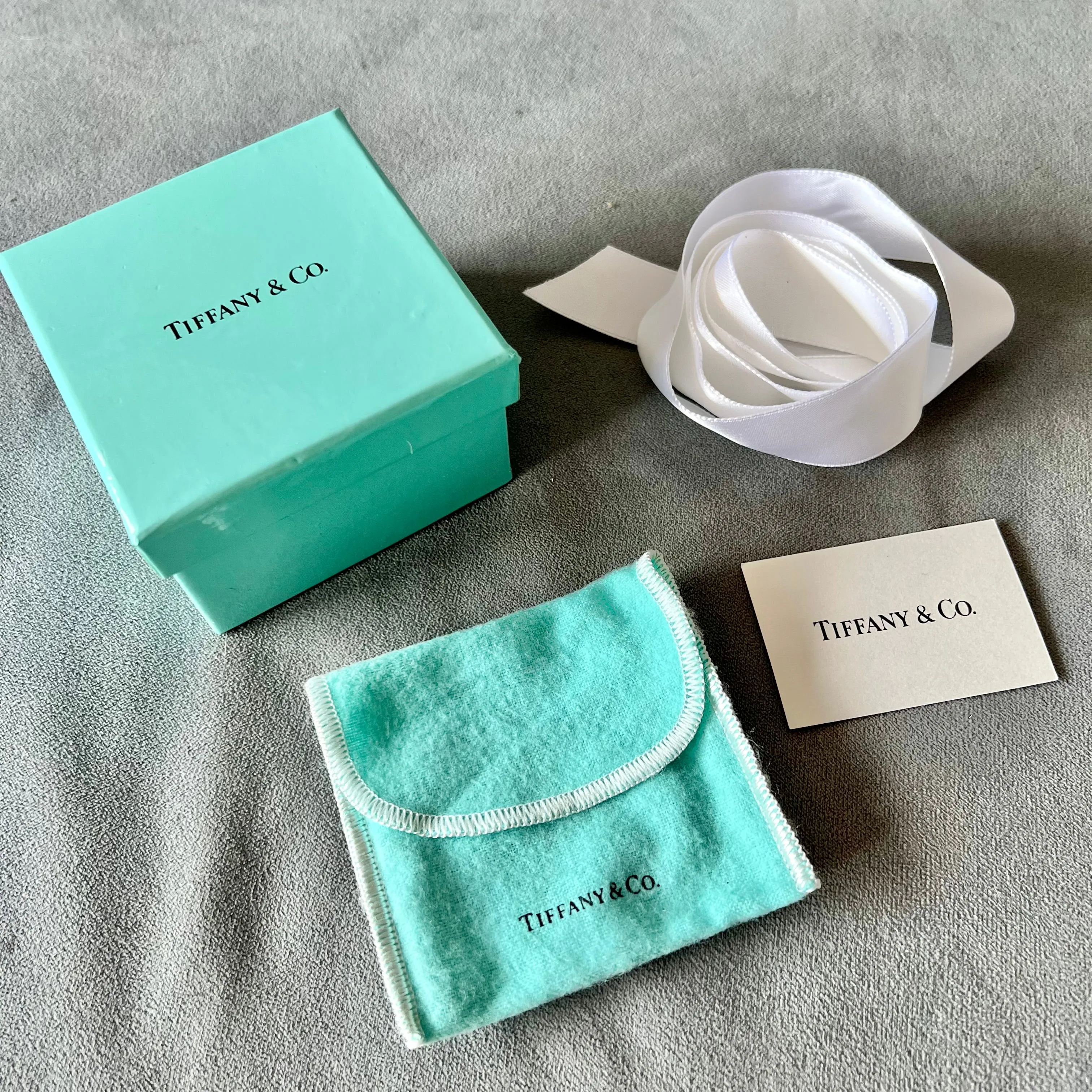 TIFFANY & CO. Jewelry Pouch + Booklet + Ribbon + Tissue + Box 3.20x3.20x2.10 inches